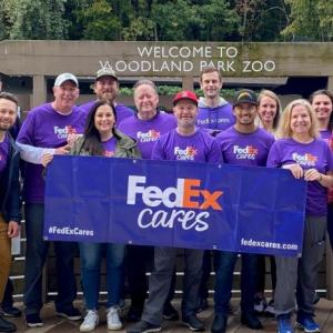 FedEx team members stood outside the Woodland Park Zoo 