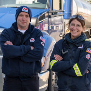 Fenton and Drummond in front of a truck