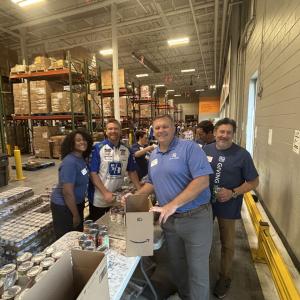 Volunteers pack boxes