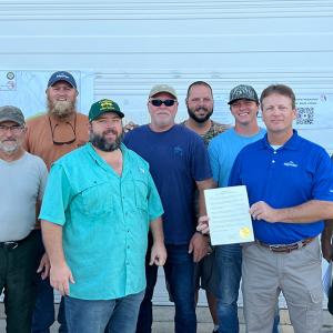 From left to right, the group includes Ethan Boatwright, Ray Howling, Matt Gibson, Judge Colt Christian, Andrew Register, Mike Stein, Jonathan Herrin, Billy Geier and Patrick Hughes.