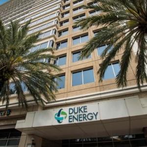 Duke Energy building with trees either side of the entrance 
