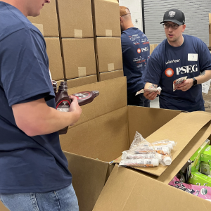 volunteers packing food