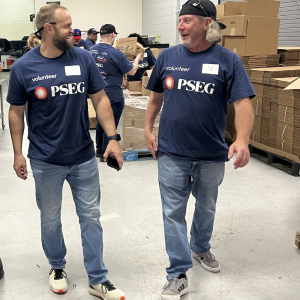 Two volunteers speaking to each other