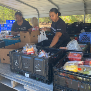 people packing food into bags