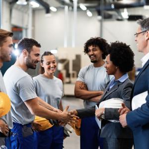 group of people holding rugby balls