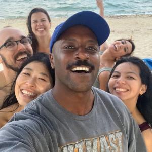 Geoffrey Brown at the beach with friends.