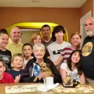 Gerri Kuo surrounded by family