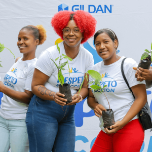 Five employees at a Gildan reforestation event