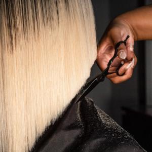 Detail of woman's haircut.