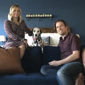 Erik Battista with his wife and dog, Zeppelin.