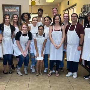 Teddy Nixon and GD ERG Group GD Green shown wearing aprons.