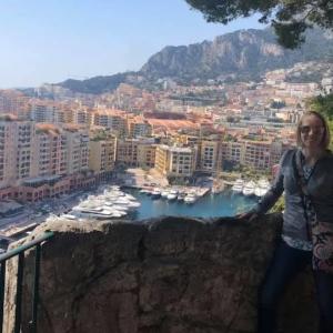 Christie on vacation; overlooking a harbor.