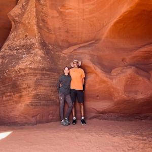 Christie and her husband inside a cave.