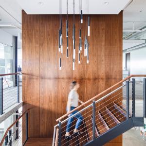 A person walking up a set of stairs.