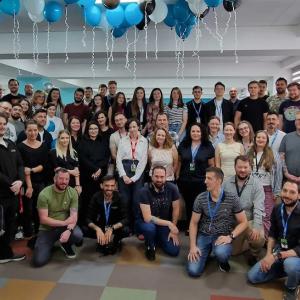 GoDaddy team celebrating a birthday in the office.