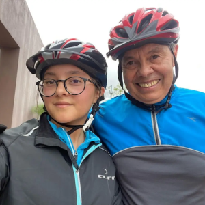 Gonzalo with his daughter after a bike ride.