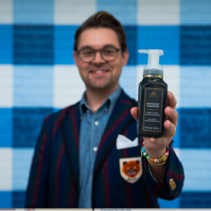  Ian Estep holding Bath&Body Works product