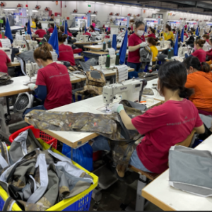 Notably, we've pledged to the American Apparel Footwear Association and the Fair Labor Association's Apparel & Footwear Industry Commitment to Responsible Recruitment, collaborating with global garment supply chain partners (e.g. the depicted SITKA factory that received FLA accreditation in 2021) to eradicate conditions fostering forced labor and ensure fair treatment of workers.