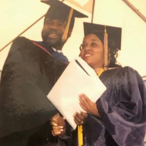 Two people during a graduation 