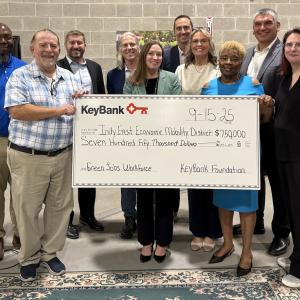 Representatives from KeyBank and IndyEast shown with a $750,000 grant check.