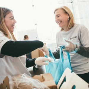 Tapestry CEO Joanne Crevoiserat volunteering at Tapestry event