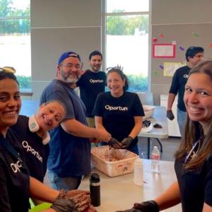 people smiling and working together