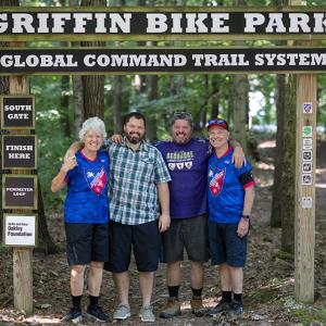The Griffin family at the trailhead to Griffin Bike Park