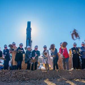 Group of people breaking ground on Junior Achievement (JA) Free Enterprise Center