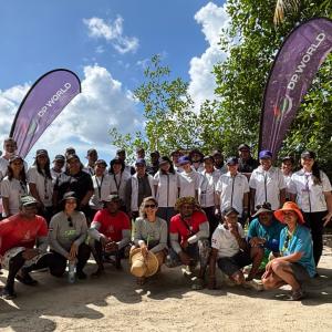 DP World employees and Fundación Verde Profundo representatives gather during a mangrove restoration activity in Boca Chica.