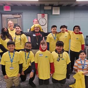 Group of children in yellow tshirts