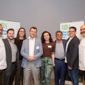 Group of people stood inline for a photo