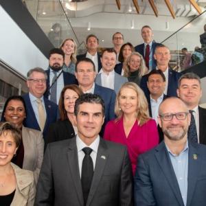 People stood on stairs for a group photo