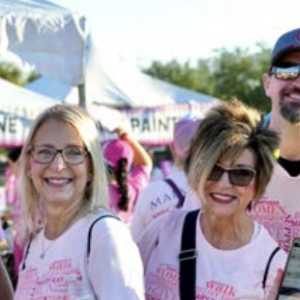 A group of people stood together for a photo 