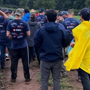 volunteers standing in a field