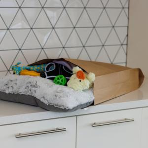 A parcel in recyclable packaging on a worktop 