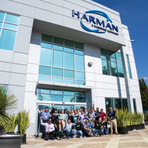 Outside of the HARMAN factory. HARMAN team shown in front of the building.