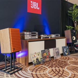 JBL turntable, speakers and receivers shown with records.