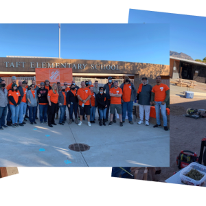 Group of Home Depot volunteers are posing in front of the Taft Elementary School where they have just completed work on several projects for the school.