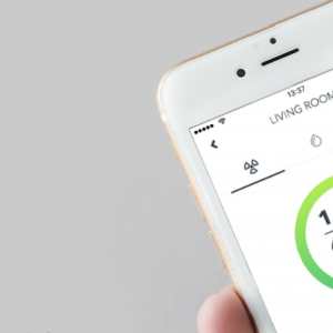 Airthings Radon detection unit and app on smartphone.