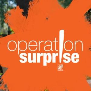 Operation Surprise! Home Depot volunteers are repairing a house. A woman is pouring cement from a bucket.