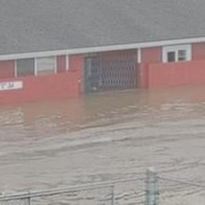 Lewis County Gospel Mission flooded in a historic January flood. Flood waters are up to window height.
