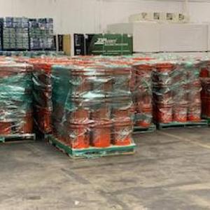 Team Depot volunteers are shown preparing 800 relief kits in the TX warehouse.