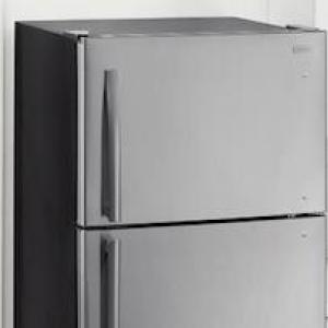 Photo of a refrigerator in a kitchen. The Home Depot Earth Month logo is shown.