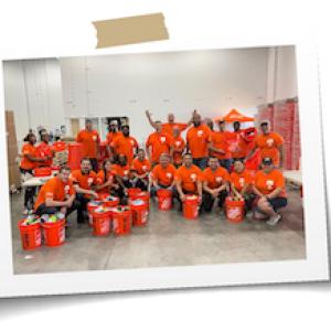 Home Depot employees preparing disaster kits.