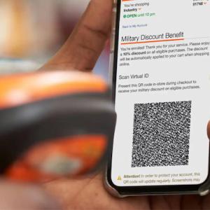 iPhone shown with the Home Depot app for Military Veterans discount.