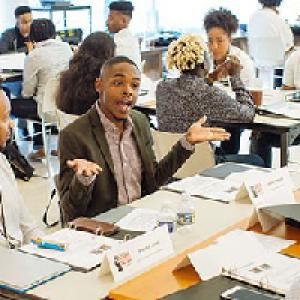 Photo montage of Black students working and studying in classrooms.