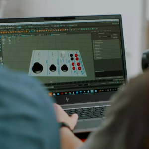 Seth Cluett, assistant director at Columbias Computer Music Center, teaching a student about historical music hardware.