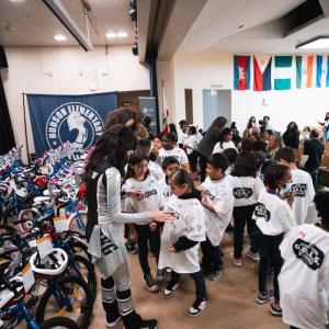 Eighty-five third graders at Hudson Elementary School in Long Beach, CA, received a brand-new bicycle from AEG’s LA Kings. 
