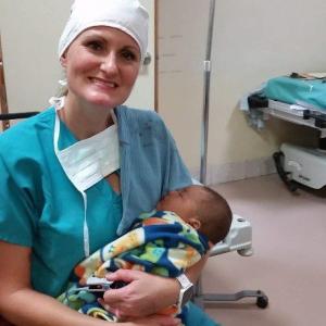 Doctor holding a baby