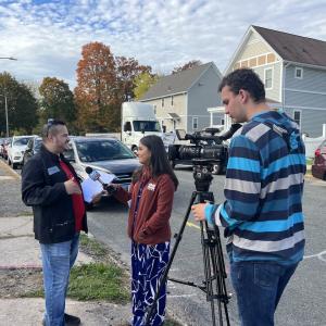 Members of the press at Habitat for Humanity event in Springfield, MA.
